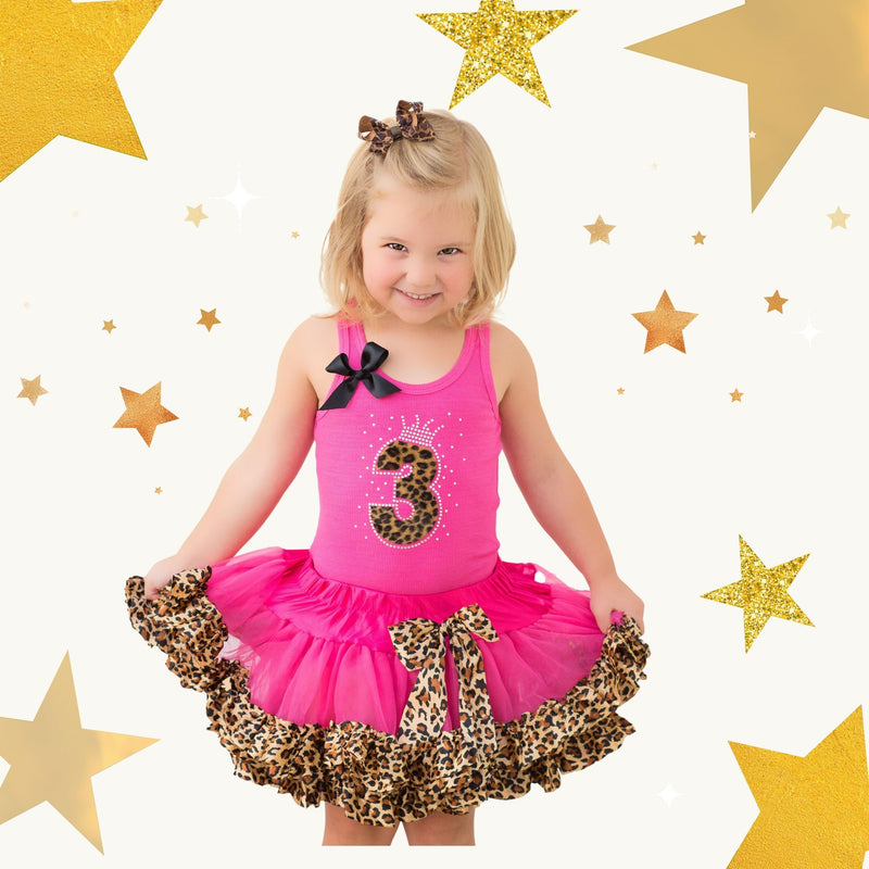 Little girl wearing pink cheetah birthday number 3 outfit