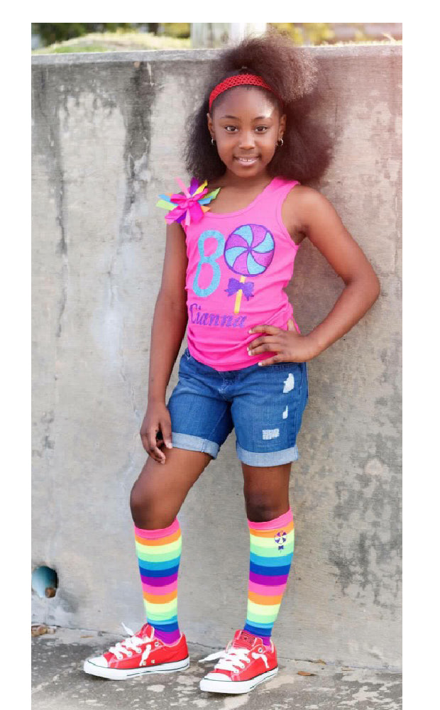 Girl wearing Bubblegum Divas Lollipop Shirt jean shorts lollipop socks 
