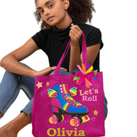 Model holding Happy Wings roller skate tote bag in pink saying Let's Roll with stripes, stars, and rainbow bow. Personalized name Olivia