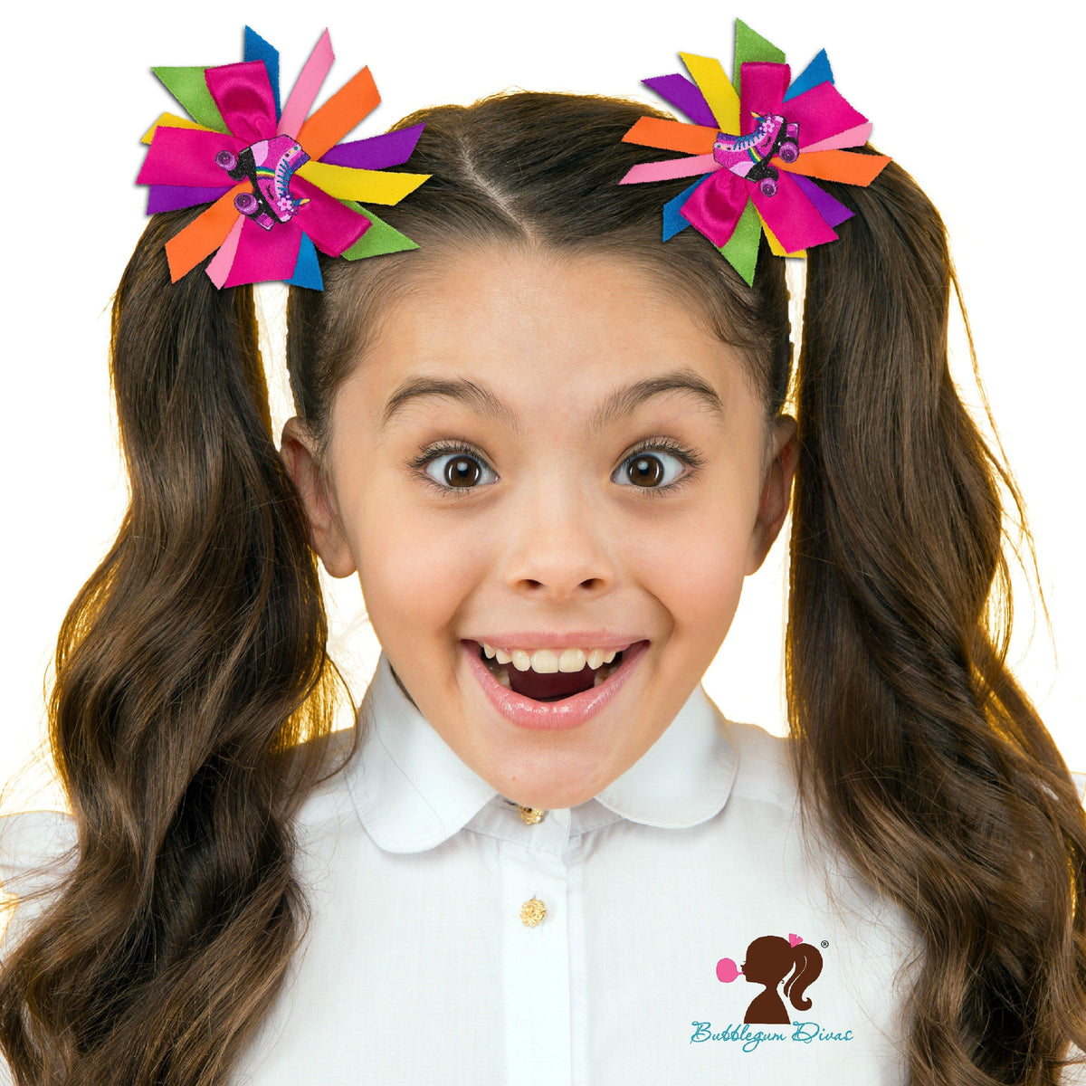 Girl wearing two Pinkie Roller Skate Rainbow Ribbon Hair Barrettes